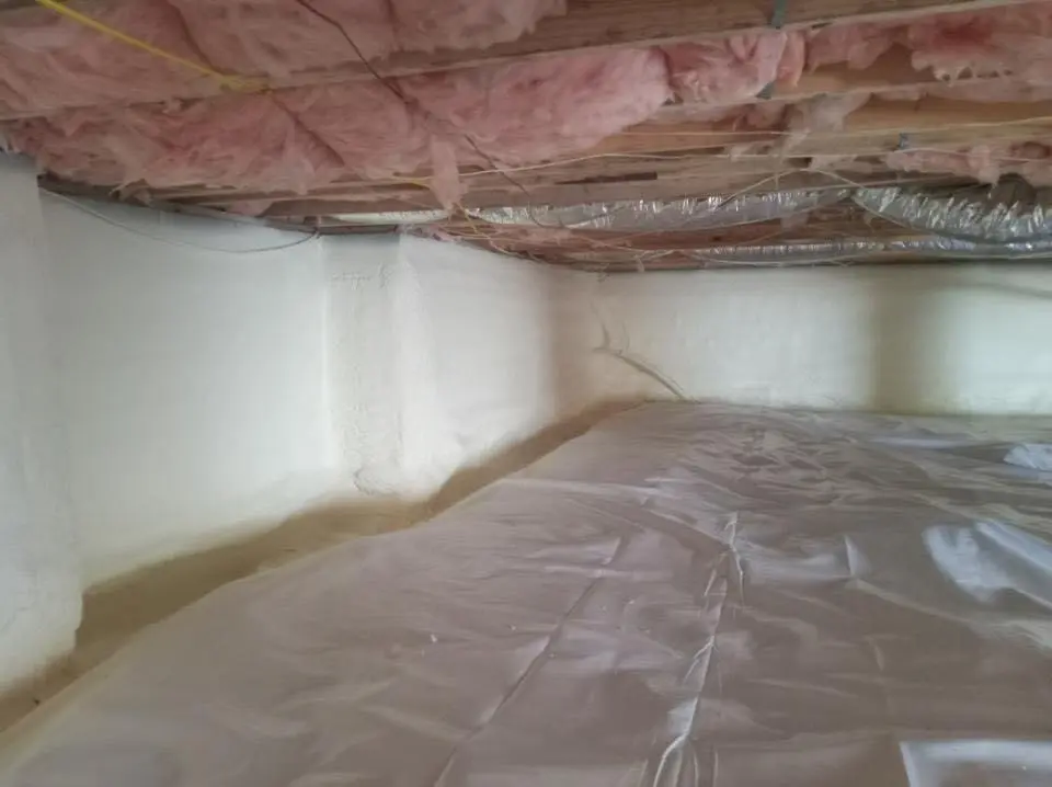 Crawl space encapsulation with closed-cell spray foam for Commercial Roof Restoration in Marietta